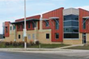 commercial metal building with corrugated metal wall panels