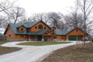 log home with standing seam metal roof